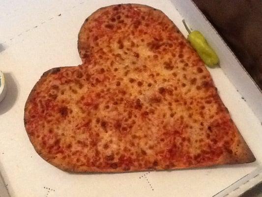 The delicious heart shaped pizza that papa johns had made for me (: