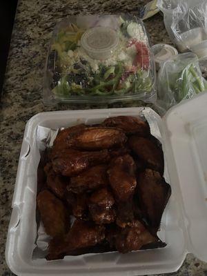 Wings and Large Greek Salad, celery sticks, blue cheese dressing