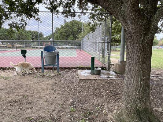 Water station, poop bags and trash can