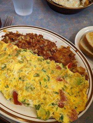 OMG delish!  Santa Fe omelette with fresh avocado and jalapenos.  Make sure to have the tomallito sauce - so fresh and so yummy.