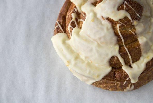 Laminated Brioche Cinnamon Roll with Orange Zest Icing