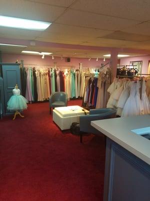 Downstairs area for bridesmaid and flower girl dresses. 3 fitting rooms.