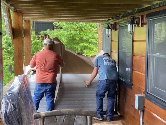 The hottub is in place!  Taking off the packing material and getting ready to hook it up