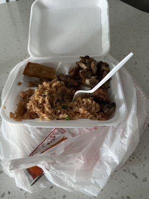 Plate with fried rice and bourbon chicken