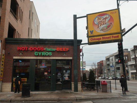 A corner storefront view, and during the Covid era.