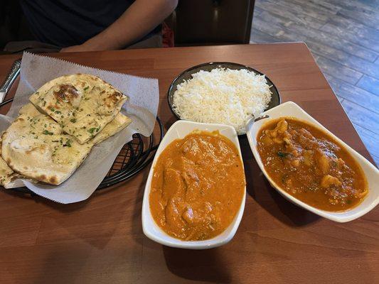 Garlic naan, butter chicken and aloo gobi