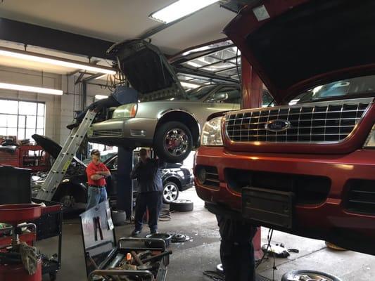 Ford Explorer XLT and Cadillac Deville