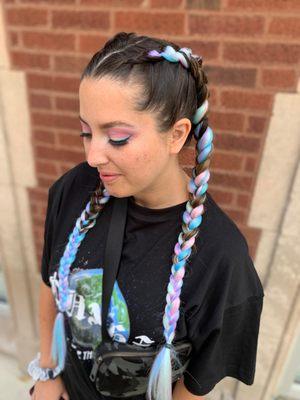 Festival braids with colorful braid in hair and fun festival eye look.