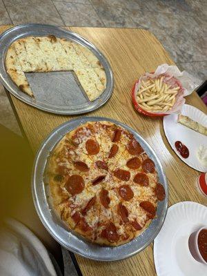 Personal pan and cheese sticks! French fries!