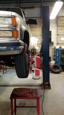 Doing an alignment on a 4 door Chevy 3500 Dually Diesel. Almost too big, but we got it done.