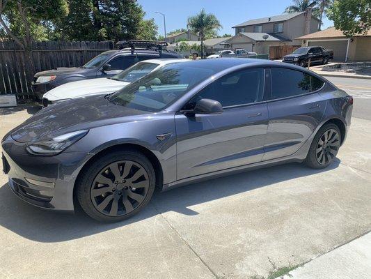 2018 Tesla Model 3 (front view driver side). Fronts at Mid Smoke and Rears at Limo.