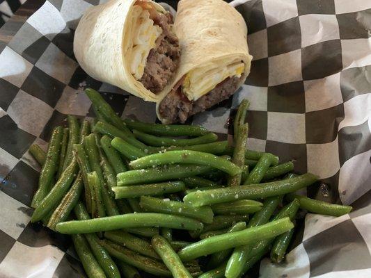 Burger as a wrap with a side of green beans