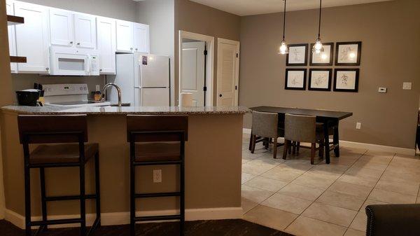 Looking from living room to kitchen and dining area