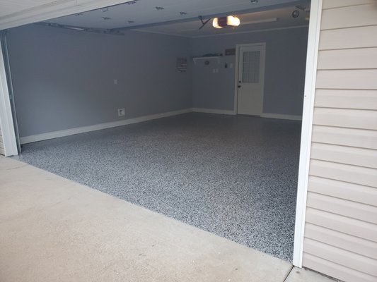 Epoxy flakes on garage floor. Very durable