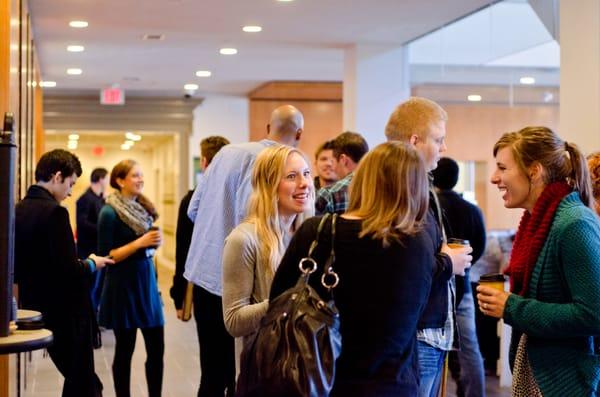 Coffee and conversation in the lobby before the Sunday Gathering.