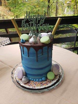 My grandmother's 69th birthday cake. Double barrel chocolate cake with peanut butter filling