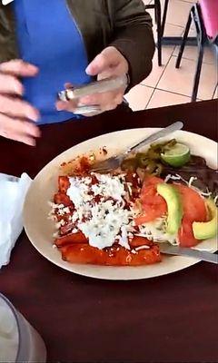 Enchiladas with fresh avocado  and 2 or one big piece of meat to perfection