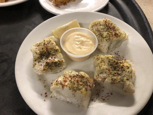 Baked Canadian Cod accompanied with our own dill sauce