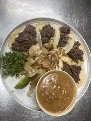 Mini Tacos : 5 mini tacos, hand-made corn tortillas, grilled onions, cilantro and charro beans (beef fajita,pastor or barbacoa)