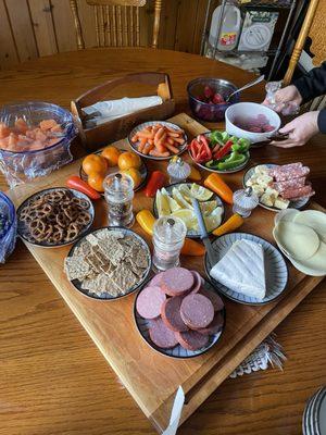 Greg's award-winning summer sausage on that charcuterie table. I'm old-fashioned I like to plate.