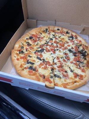 White margarita pizza! The tomatoes were cut up and so juicy! Lots of basil and garlic!