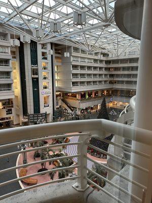 View overlooking airport lobby. The door to the balcony did not open. I don't think any hotel guests can access the small balconies.