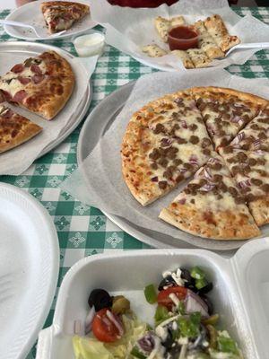 Cheese Bread, Garden Salad, thin crust beef and onion, regular crust Canadian bacon & mushroom