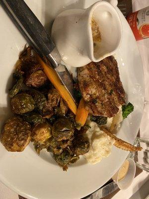 Grilled Pork Tenderloin Chop with Dijon Gravy, and side of crispy Brussels sprouts