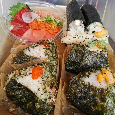 Onigiri, hand roll and sashimi