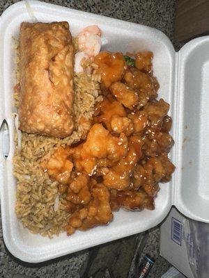 Sesame chicken with rice and eggroll combination