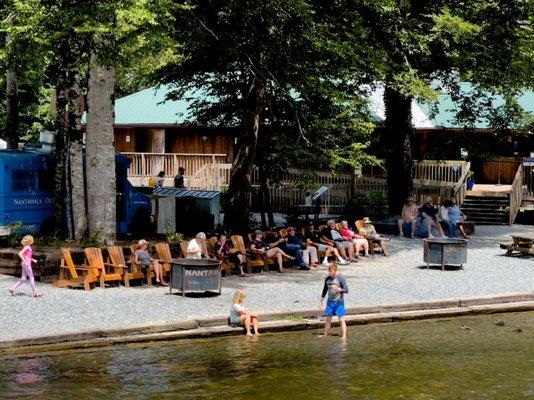 Lots of Adirondack chairs for those who want to rest and enjoy the river. Great place for children and grandchildren to wade.