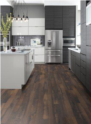 Laminate floors are great! These are Shaw Biltmore in Emberglo.