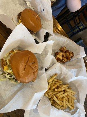 Cheeseburger. Cheeseburger with the works, cheese curds and fries.