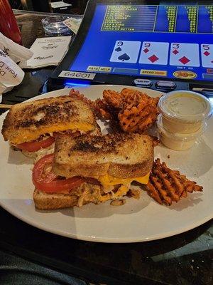 Tuna melt with sweet potatoe fries, love being able to order from Manhatten Deli menu at bar!  #atlantissportsbar