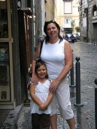 Kathy. 16 years experience, DONA certified  postpartum doula and Lactation counselor
 Speaks Italian fluently.