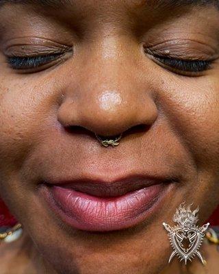 Fresh septum piercing with 14k jewelry!