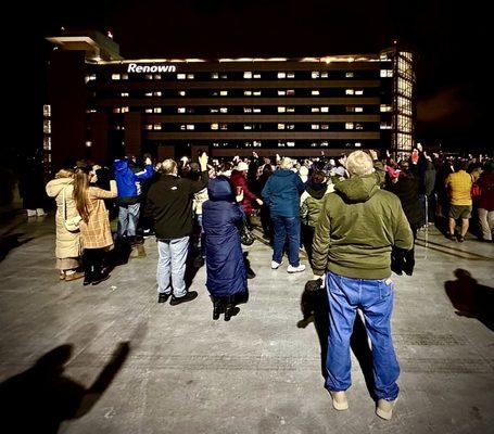 11/25/24 6th floor Renown Parking Garage "rooftop candlelight vigil for Katie Histing..." Katie was looking back from her window.