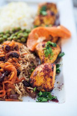 Free-Range Chicken Kabob with Qabuli Palao (Basmati Rice browned and topped with seared carrots & raisins)