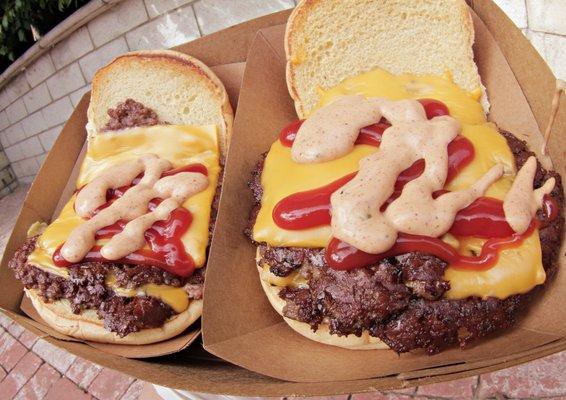 Two Double Burgers Topped with Wild Sauce & Ketchup!