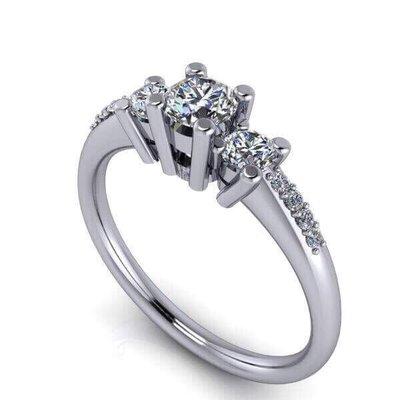 14k white gold 3 diamond ring with pave' diamonds on the side.