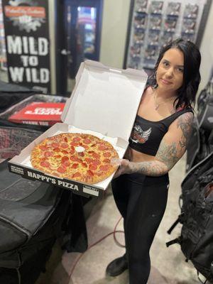 Angel Kass serving up some HOT pizza!