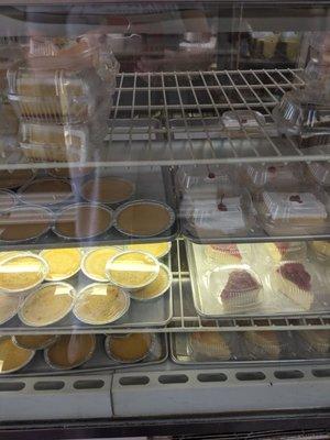 Case of cakes and flan