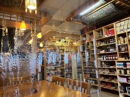 Restaurant + store. Tables separated by plastic curtain, which I appreciate now that Covid is surging again.