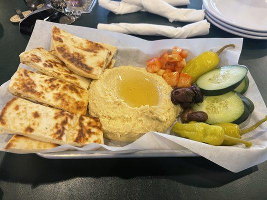 Soooo good. The pita was warm with a crisp, the hummus was fresh and flavorful and the olives were also really good.