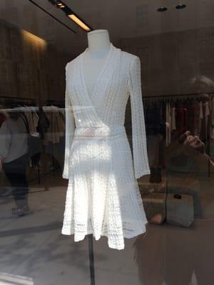 Very pretty dress in the window enticed me to enter the store.