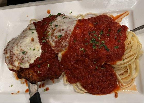 Chicken Parmigiana over linguine