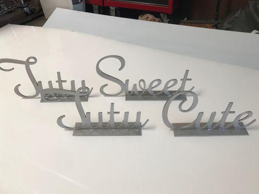 Laser cut signs/painted