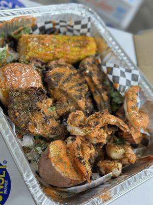 Surf & Turf Platter ( Chesapeake Lamb Chops & Shrimp with Potatoes & Corn)