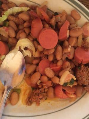 These are 'charro beans'. Pinto beans, ground beef, and hot dog wieners?  VERY DISAPPONTED.