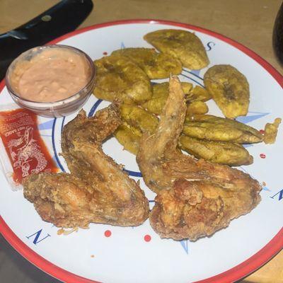 Fried Chicken Wings with Fried Plantains.